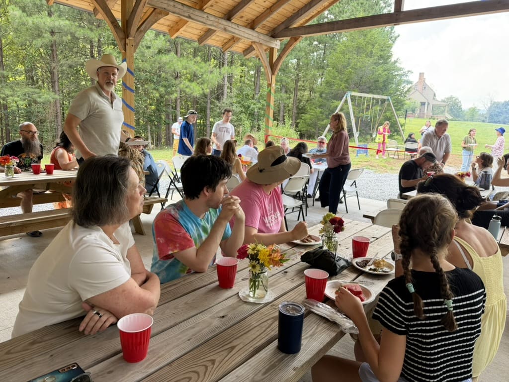 Gathering under the new Autism Sanctuary pavilion