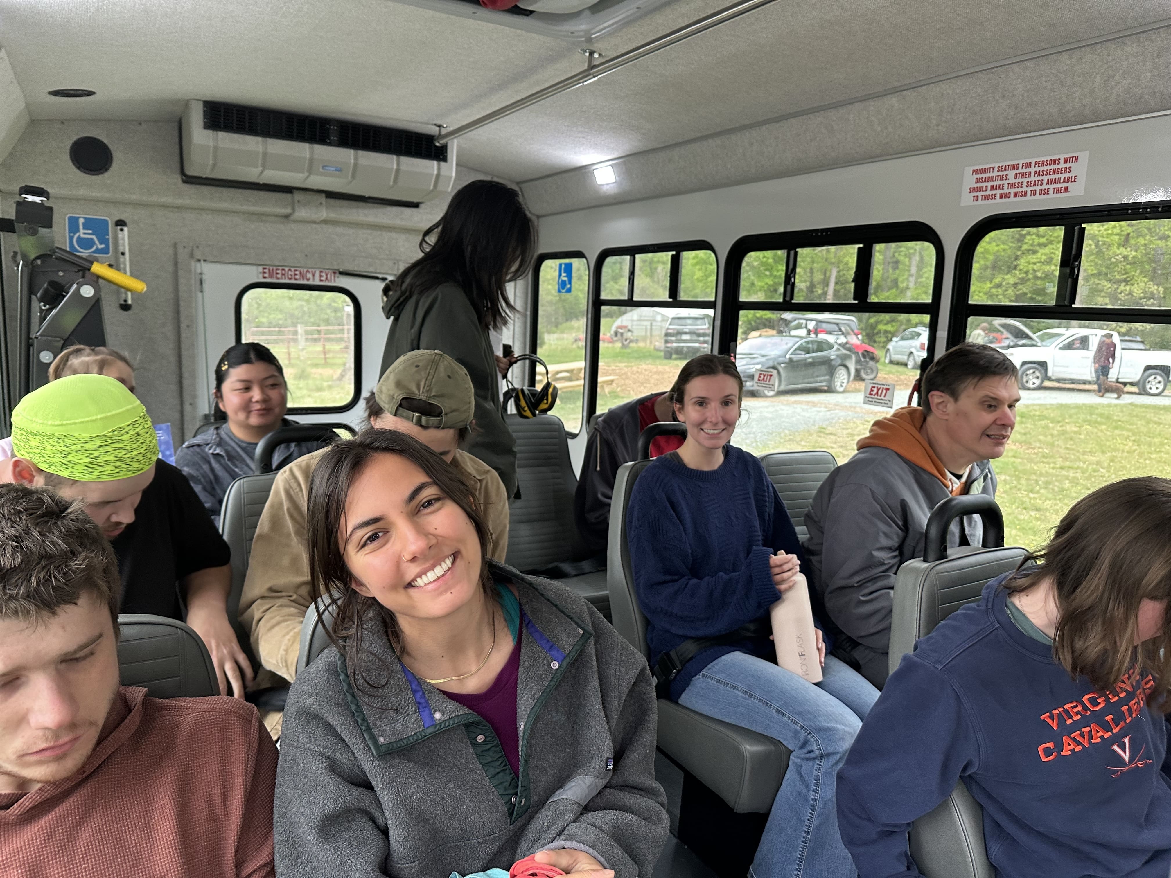 Members and staff with the new bus